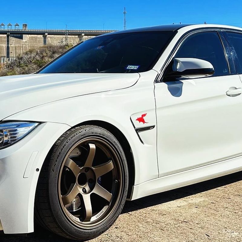 Dillo sticker on a white BMW M3 at Mansfield Dam